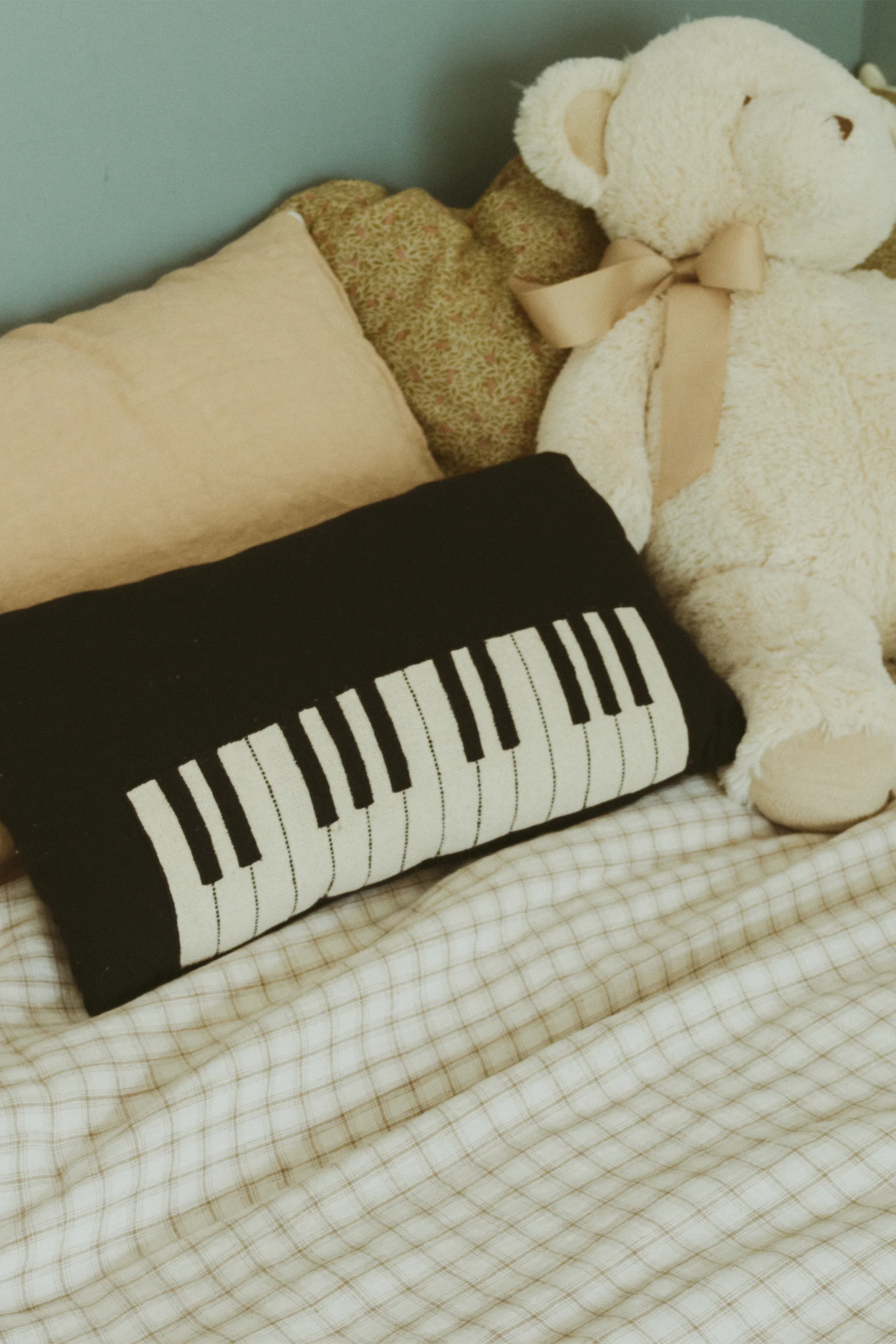 COJÍN PIANO